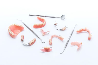 Affordable Solutions for Missing Teeth: Bridges, Implants, and Dentures